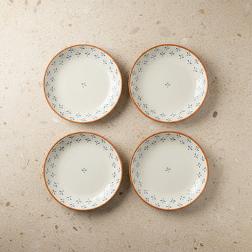 The Folklore Dinner Plate, 26cm — set of 4 flatlay in hand-placed cobalt blossom motif