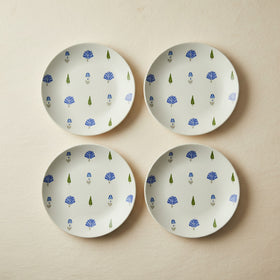 The Solitude Quarter Plate, 18cm — set of 4 flatlay with cobalt motif at centre