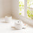 "Enhance your home decor with our ceramic Wave Whisperer planter, a beautiful blend of form and function, ideal for showcasing small indoor plants and adding a personal touch.