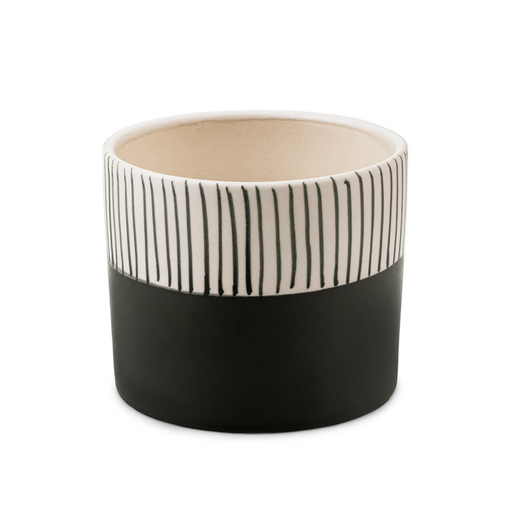 Enhance your indoor space with the Stripe Hype, a handcrafted ceramic planter boasting a modern two-tone design, perfect for small plants or herbs, among our top indoor planters.