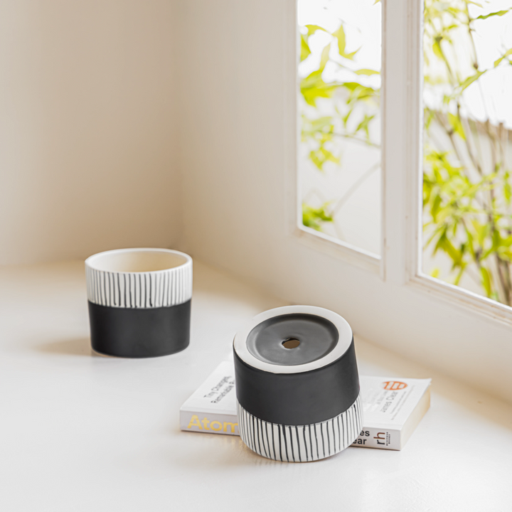 Handcrafted, toxin-free ceramic Stripe Hype planter, featuring a modern two-tone design, perfect for small indoor plants or herbs, embodying Claymistry's eco-friendly, high-quality craftsmanship.