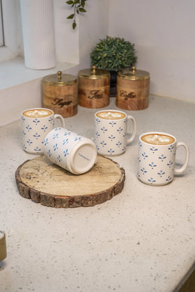 The Folklore Mug (Set of 6, 380ml) styled on a dining table