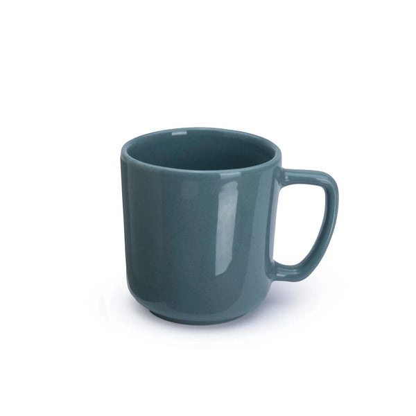 Teal mug on a white background
