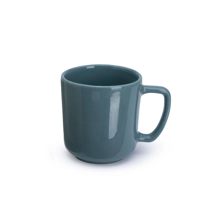 Teal mug on a white background