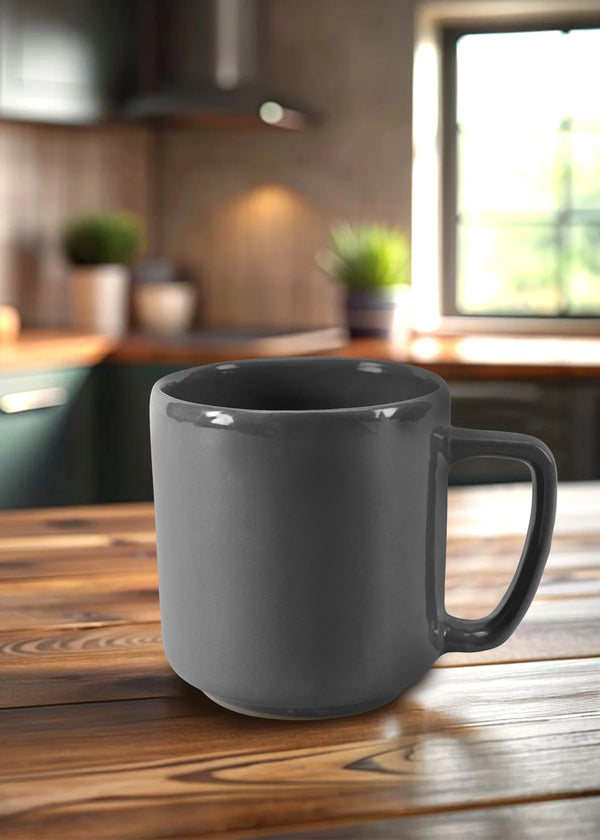 Navy Blue mug on a wooden kitchen counter with a blurred background