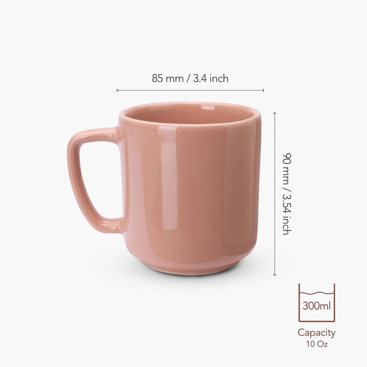 Pink mug with measurements and capacity label on a white background