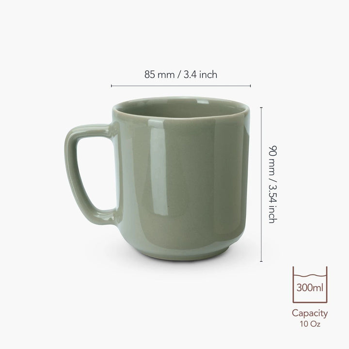Green mug with dimensions and capacity label on a white background