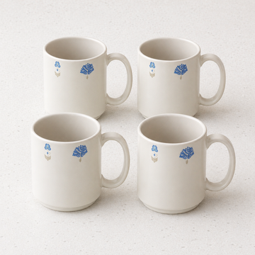 The Solitude mug in a matte reactive glaze with a single cobalt motif, set of 4 mugs designer - stoneware mugs