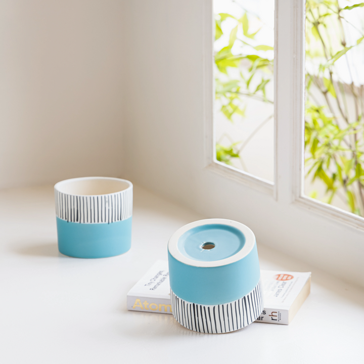 Modern two-tone ceramic planter, handcrafted for indoor plants or herbs, showcasing Claymistry's unique design flair in toxin-free ceramics.