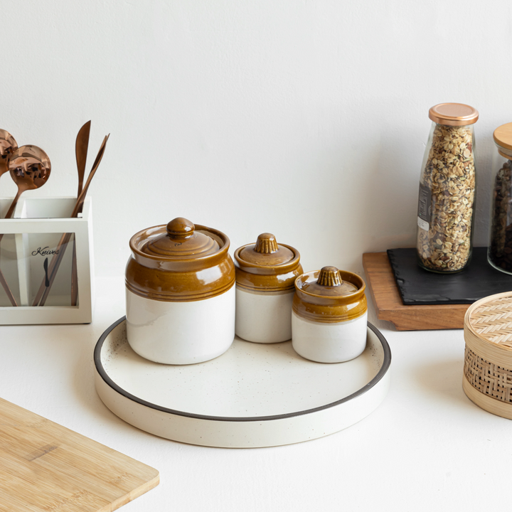 Pretty sand ceramic tray with black rim and speckles, sustainable and perfect for modern homes.