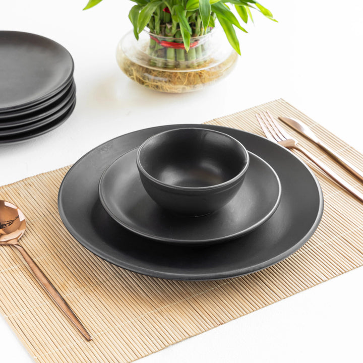 Handmade black ceramic dinner set, non-toxic, lead-free, and perfect for stylish ethical dining