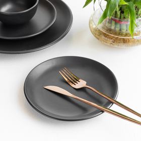 Night Sky Dinner Set paired with brass cutlery in a table setting