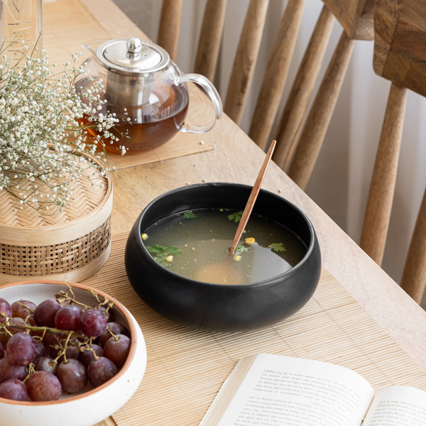 1L black ceramic serving bowl, handmade and non-toxic with a smooth finish for home dining.
