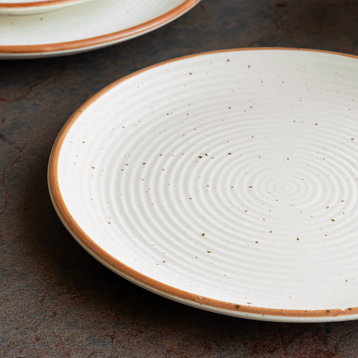 Bone ash-free ceramic quarter plate in sand glaze with speckles, ethically crafted and stylish