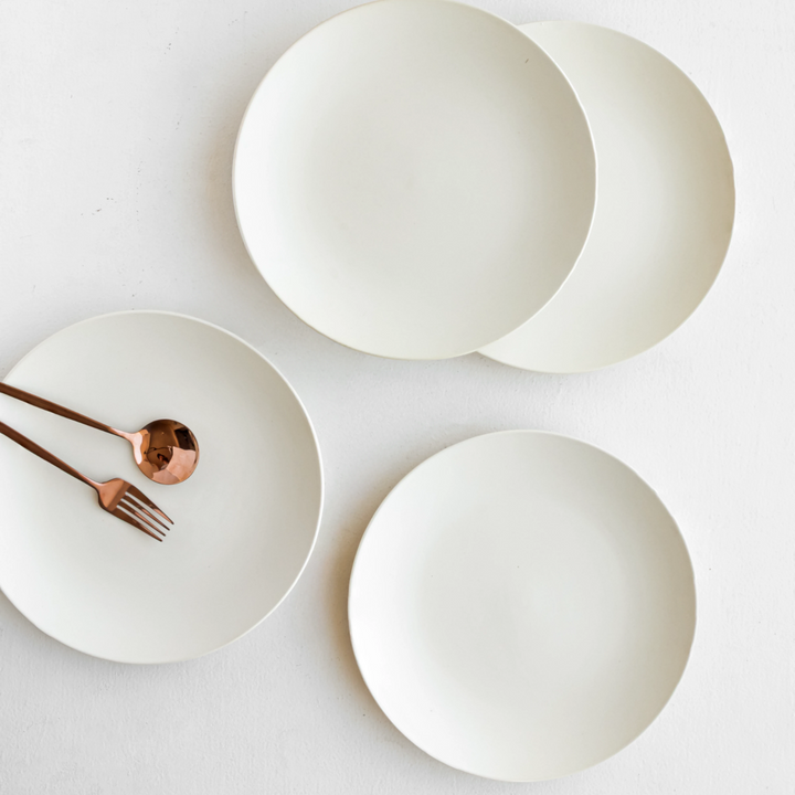 Elegant white ceramic dinner plate, bone ash-free, handcrafted for safe, ethical daily dining