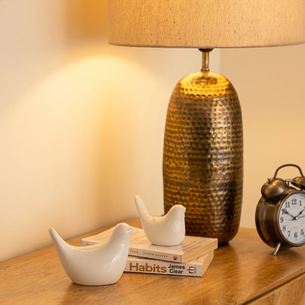 Handmade black and white bird ceramic figurines, perfect for peaceful office or shelf decor.