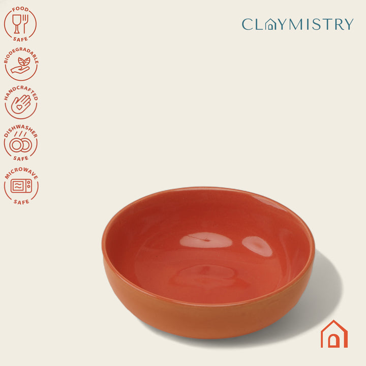 Pretty 300ml orange ceramic bowl with glazed finish, microwave and dishwasher safe.