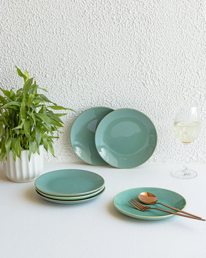 Ethically handcrafted ceramic plate with seafoam glaze, bone-ash free and stylish for home dining.