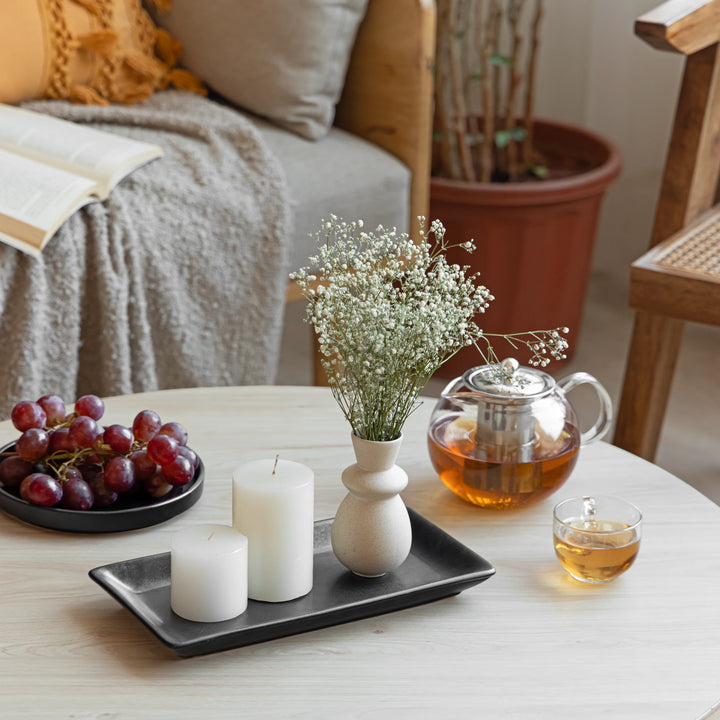 Artisan-crafted black ceramic trays, safe and sustainable for everyday serveware and decor.
