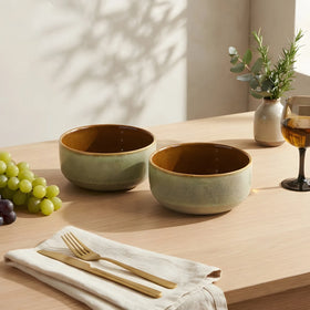 Grove ceramic serving bowl, sage green outside with a warm brown glazed interior