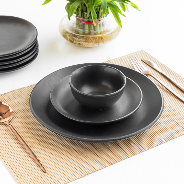 Eco-conscious deep black ceramic dinner plate with toxin free glaze for daily use