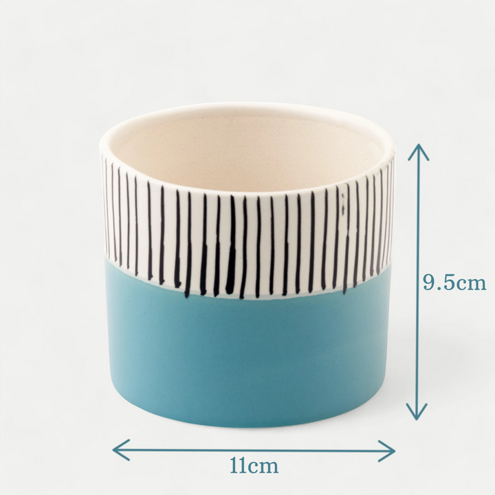 Modern two-tone ceramic planter, handcrafted for indoor plants or herbs, showcasing Claymistry's unique design flair in toxin-free ceramics.