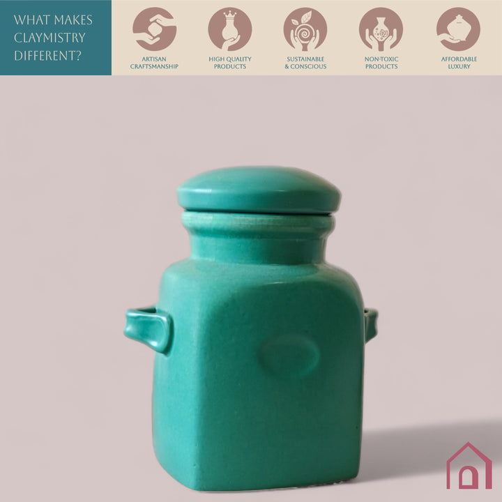 Durable teal ceramic jar with lid, handmade and glazed, adds pretty minimal charm to storage.