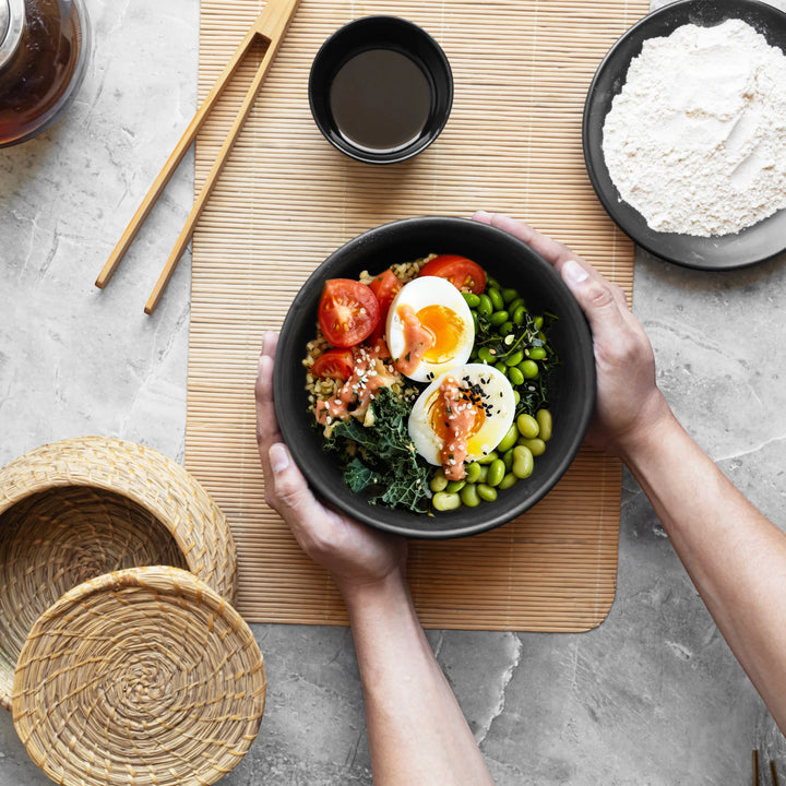 Elegant handmade 1L black ceramic bowl, arsenic-free and finely glazed for stylish food serving.