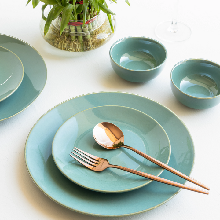 Elegant seafoam green ceramic dinnerware set, lead-free and dishwasher safe for fine dining.
