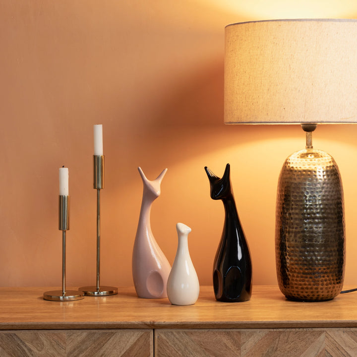 Forest-inspired ceramic deer family set, handmade and elegant for bedroom or living room decor.