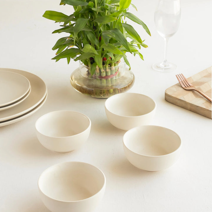 Glazed white ceramic dinner set with bowl, quarter and dinner plate, ethically handmade.