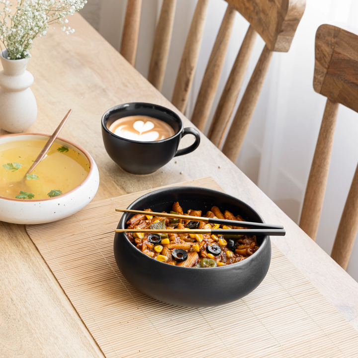 Handmade 1-litre black ceramic bowl, lead-free and durable with stylish artisan finish.