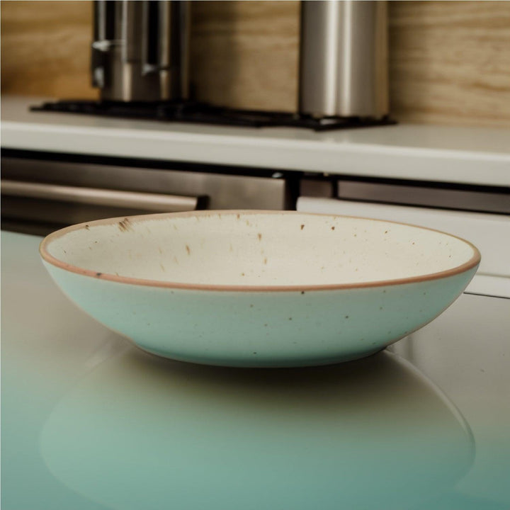Beautifully handcrafted 24cm wide ceramic pasta bowl in sand and maroon, microwave and lead-free.