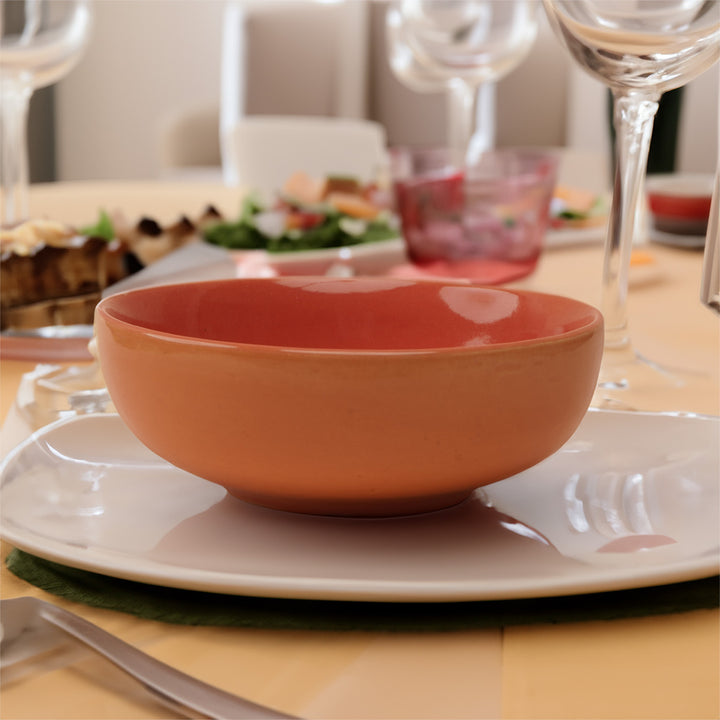 Beautiful 300ml handcrafted orange ceramic bowl, food-safe and perfect for modern kitchens.