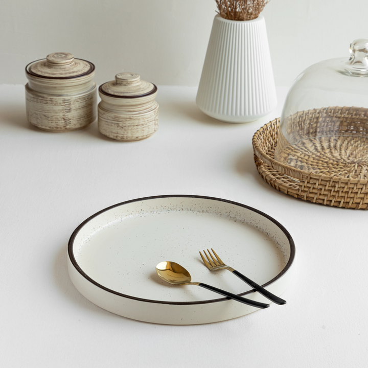 Beautiful handcrafted ceramic tray with speckles and black rim, microwave and dishwasher safe.