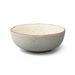 Display image of Handcrafted speckled ceramic bowl with a natural matte finish and brown rim