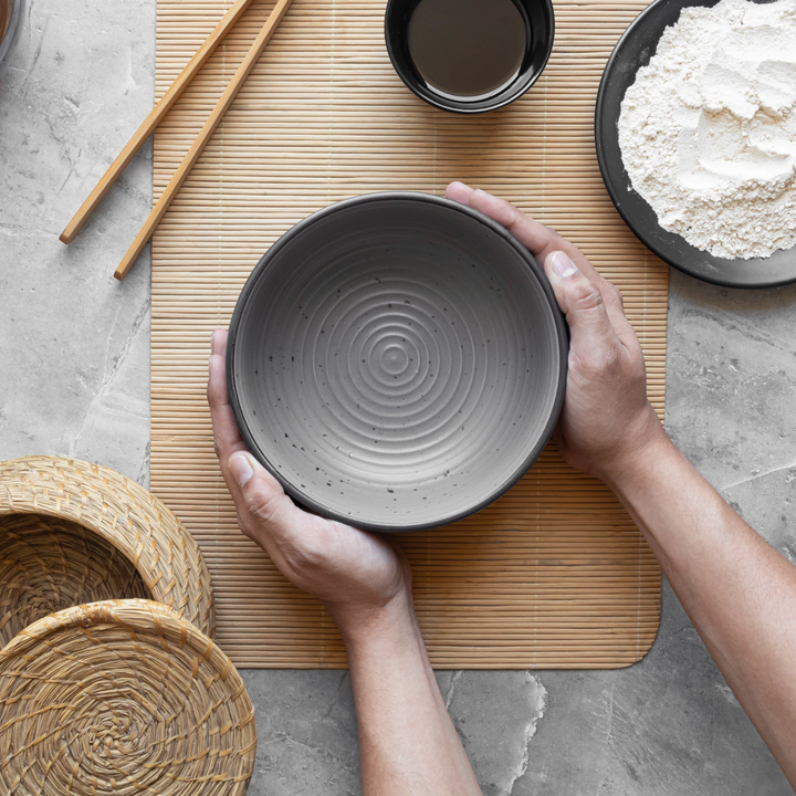 Durable and handmade grey ceramic bowl 1 litre, with silver edge for daily use.