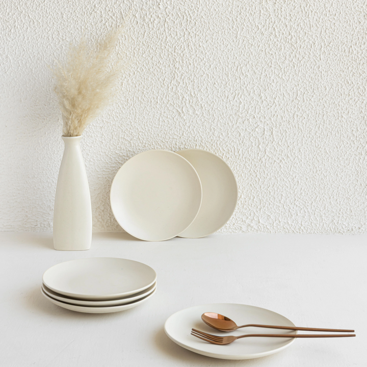 Lead-free white ceramic quarter plate, ethically made with artisan finish and timeless white glaze.