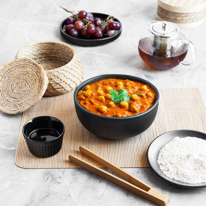 Artisan ceramic serving bowl 1L in matte black glaze, 100% bone ash-free and elegant for daily use.