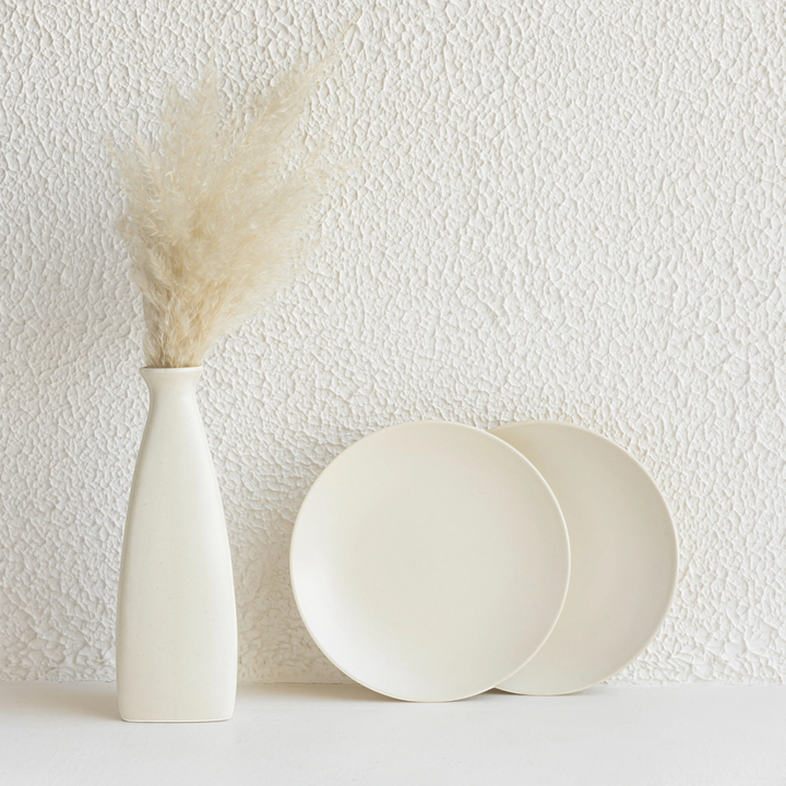 Non-toxic white ceramic side plate, crafted for everyday use with smooth glaze and natural beauty.