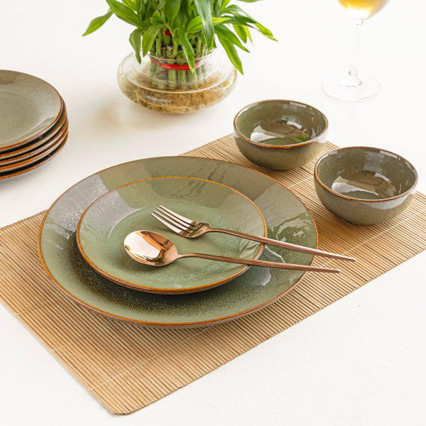 Beautiful handmade olive green ceramic dinner set with safe materials for elegant home dining.
