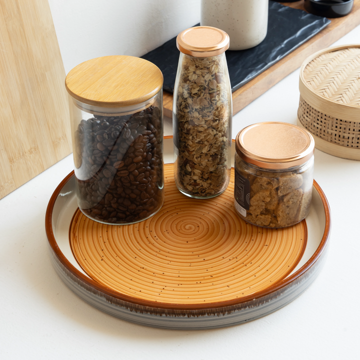 Beautiful ceramic tray in earthy tones, spill-proof and dishwasher safe for daily home use.
