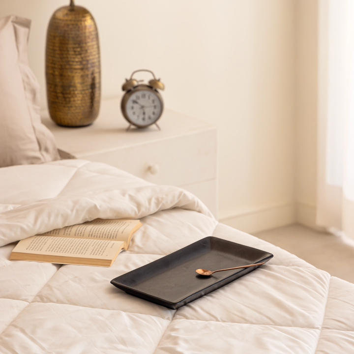 Sophisticated black ceramic tray set with clean lines, handmade for premium kitchen styling.