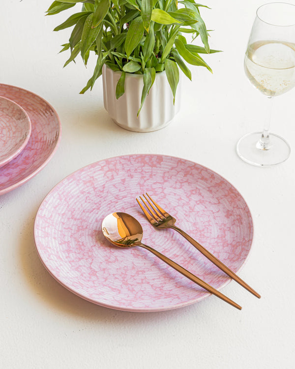 Handmade rose-glazed ceramic dinner plate, non-toxic and crafted for durable, elegant daily dining.