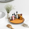Handmade round ceramic tray in orange, brown & white, non-toxic and safe for organising your space.