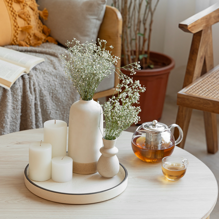 Minimalist ceramic serving tray in sand with speckles, pretty and artisan-crafted to last.