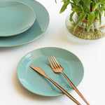 Handmade ceramic quarter plate in seafoam green glaze, non-toxic and safe for stylish daily use