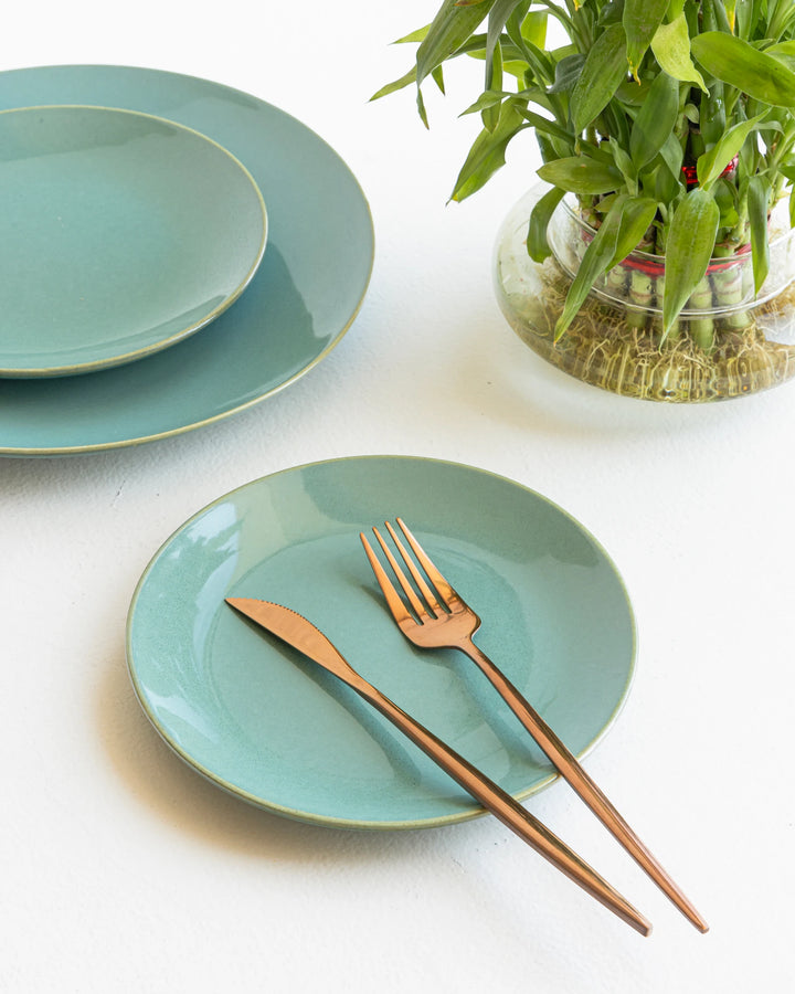 Handmade ceramic quarter plate in seafoam green glaze, non-toxic and safe for stylish daily use