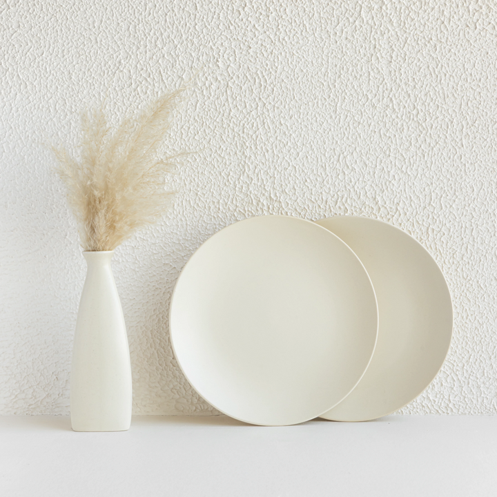 Handmade ceramic dinner plate in white glaze, toxin-free, durable, and dishwasher safe